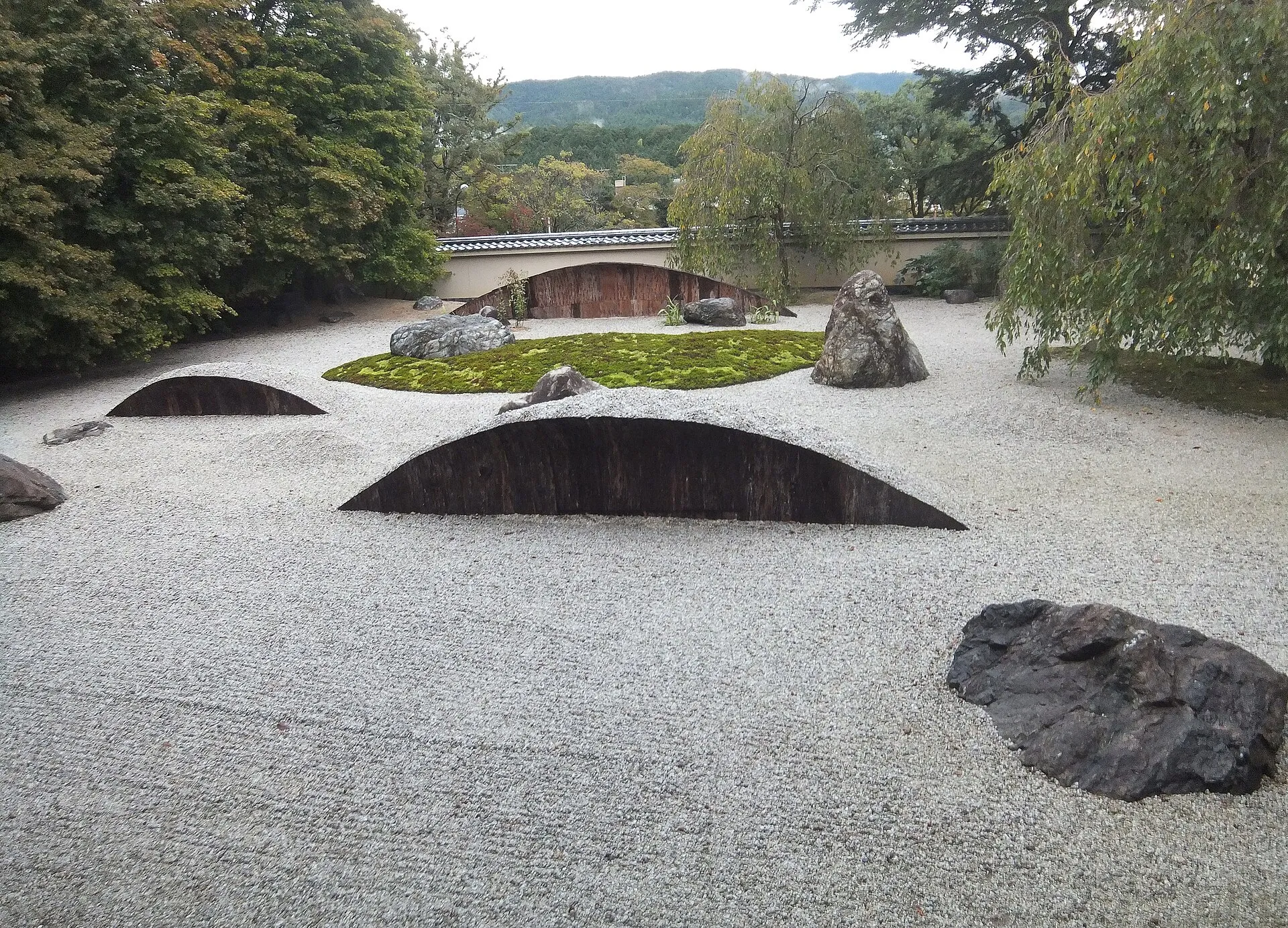 A temple garden with raked gravel and stones